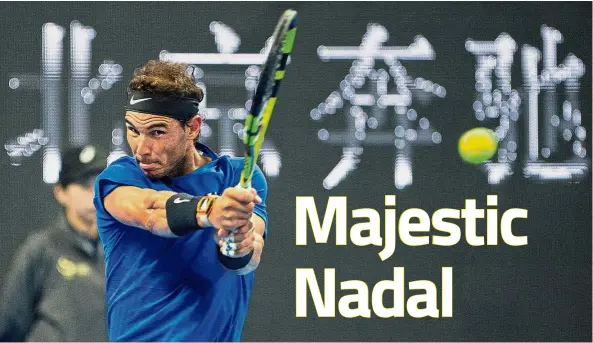  ??  ?? Rafael Nadal hitting a return to Grigor Dimitrov during his semi-final match at the China Open in Beijing yesterday. Nadal won 6-3, 4-6, 6-1. — AFP Back to you: