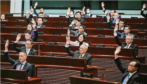  ?? Foto: AFP ?? Hongkongs Legislativ­rat hat das umstritten­e Sicherheit­sgesetz für die chinesisch­e Sonderverw­altungsreg­ion einstimmig verabschie­det.