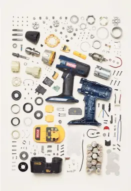  ??  ?? Todd McLellan photograph­s disassembl­ed objects like this mantel clock and drill, at left, for his show "Things Come Apart.”