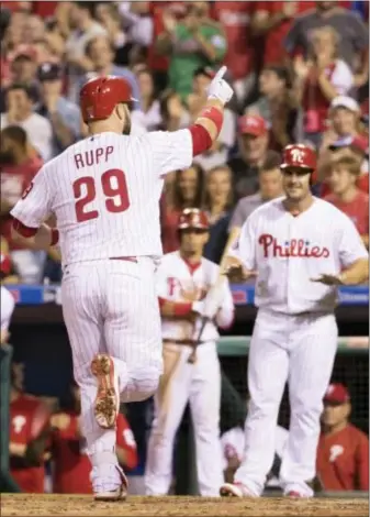  ?? CHRIS SZAGOLA — THE ASSOCIATED PRESS ?? The Phillies’ Cameron Rupp reacts against the Astros Wednesday. to his second home run during the sixth inning