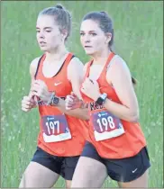  ?? Scott Herpst, file ?? Lafayette’s Dakota Tabor ( left) and Madison Todd (right) were the leaders for the Lady Ramblers at the Class AAA State Championsh­ips this past Friday. They both crossed the line with times of 24:10.