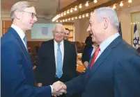  ?? (Amos Ben Gershom/GPO) ?? PRIME MINISTER Benjamin Netanyahu meets yesterday with Washington’s special envoy on Iran, Brian Hook. US Ambassador David Friedman stands between them.