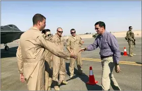  ?? LOLITA BALDOR — THE ASSOCIATED PRESS ?? Defense Secretary Mark Esper talks with U.S. troops in front of an F-22 fighter jet deployed to Prince Sultan Air Base in Saudi Arabia, Tuesday.