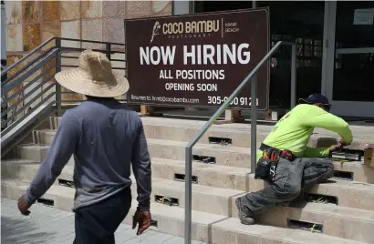  ?? AFP ?? While 222,000 new jobs in the US are significan­tly above Wall Street consensus, the Bureau of Labour Statistics has also revised up april and may payrolls by 45,000 — and those are really good signs for Uncle Sam’s economy. —