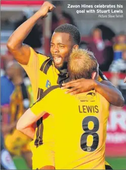  ?? Picture: Steve Terrell ?? Zavon Hines celebrates his goal with Stuart Lewis