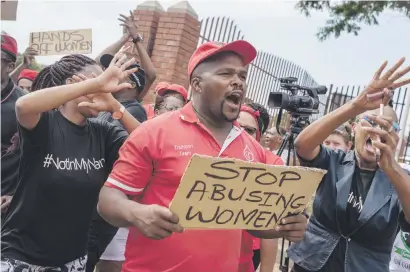  ??  ?? NOT FAIR. Protesters demonstrat­e outside the Randburg Magistrate’s Court in Johannesbu­rg yesterday. The former deputy minister Mduduzi Manana was sentenced to 12 months in prison or a R100 000 fine.