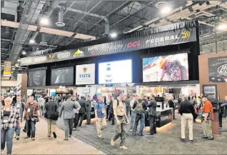  ?? Doug Nielsen ?? Attendees at the 2020 SHOT Show gathered at the Sands Expo Center in Las Vegas to talk about all things hunting and shooting. Because of COVID-19, the National Shooting Sports Foundation moved the show into the virtual world for 2021 but plans to return in 2022.