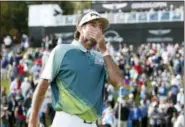  ?? RYAN KANG — THE ASSOCIATED PRESS ?? Bubba Watson reacts on the 18th green after winning the Genesis Open golf tournament at Riviera Country Club Sunday in the Pacific Palisades area of Los Angeles.