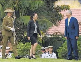 ?? Dean Lewins Pool Photo ?? NEW ZEALAND leader Jacinda Ardern visits with Australian Prime Minister Malcolm Turnbull in Sydney last week. One fan said of her: “She’s the rebellion.”