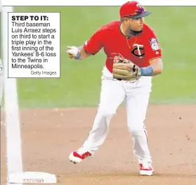  ?? Getty Images ?? STEP TO IT: Third baseman Luis Arraez steps on third to start a triple play in the first inning of the Yankees’ 8-6 loss to the Twins in Minneapoli­s.