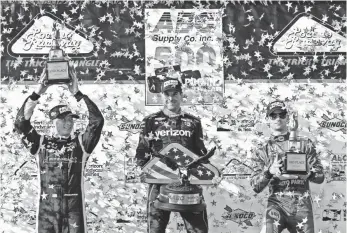  ?? MATTHEW O’HAREN, USA TODAY SPORTS ?? Will Power, center, with Joseph Newgarden, left, and Alexander Rossi, got his third win of 2017 on Sunday at Pocono Raceway. Newgarden, his Team Penske teammate, also has three victories.