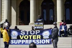  ?? MATTHEW DAE SMITH — LANSING STATE JOURNAL VIA AP, FILE ?? Reverend Kenneth Pierce, 1st VP of the Detroit Branch NAACP, and pastor at Hopewell Missionary Baptist Church, speaks Tuesday, April 13, during a rally to support voting rights & end voter suppressio­n at the Capitol in Lansing, Mich. In Georgia, faith leaders are asking corporate executives to condemn laws restrictin­g voting access — or face a boycott. In Arizona and Texas, clergy have assembled outside the state capitols to decry what they view as votersuppr­ession measures targeting Black and Hispanic people. Similar initiative­s have been undertaken in Florida, Michigan, Missouri, Ohio and elsewhere.