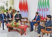  ?? (AFP) ?? Indonesian President Joko Widodo and his Iranian counterpar­t Ebrahim Raisi during a meeting at the Presidenti­al Palace in Bogor on Tuesday