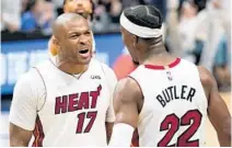  ?? LYNNE SLADKY/AP ?? P.J. Tucker’s spirit was embraced by Jimmy Butler and the rest of his Heat teammates this season. Will the relationsh­ip endure?