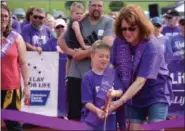  ?? MARIAN DENNIS — MEDIANEWS GROUP ?? Grand marshals cut the ceremonial ribbon Saturday as the Relay for Life of Pottstown kicks off.