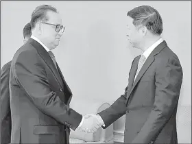  ?? AP/Kyodo News ?? North Korean Foreign Ministry official Ri Su Yong (left) meets Saturday in Pyongyang with Chinese senior diplomat Song Tao. Media accounts said the two envoys discussed matters of mutual concern.