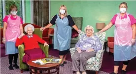  ??  ?? Worried: Louise, centre, with staff and residents at Cumnor Hill