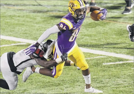  ?? Hans Pennink / Special to the Times Union ?? University at Albany receiver Jerah Reeves carries the ball against St. Francis. Reeves had six catches for 104 yards and a touchdown.
