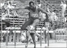  ?? (AP file photo) ?? Edwin Moses coasts to an easy victory in the 400-intermedia­te hurdles as the 1980 U.S. Olympic trials opened June 21, 1980, in Eugene, Ore. Forty years later, Moses recalls former President Jimmy Carter’s “horrible” decision to boycott the Moscow Games.