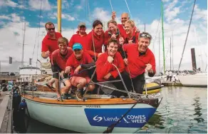  ??  ?? The crew of the 1939 classic Whooper celebrate their overall win at Cowes Week