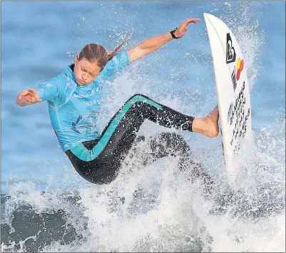  ?? [BOB EDME/THE ASSOCIATED PRESS] ?? Bianca Buitendag of South Africa rides a wave during a semifinal of the Women’s Open competitio­n in the Internatio­nal Surfing Associatio­n World Surfing Games in Biarritz, France, on Monday. Buitendag reached the final round, where she finished fourth.