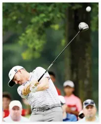  ??  ?? Jimmy Walker tees off on the ninth hole during the second round of the Bridgeston­e Invitation­al golf tournament at Firestone Country Club Friday in Akron, Ohio. (AP)