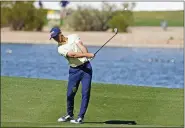  ?? DARRYL WEBB — THE ASSOCIATED PRESS ?? Billy Horschel hits across water on the 15th hole during the second round of the Phoenix Open earlier this month in Scottsdale, Ariz.