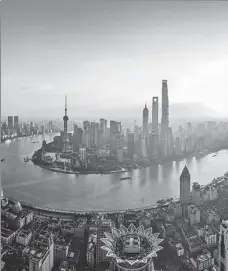  ?? CHEN ZHONGQIU / FOR CHINA DAILY ?? A morning view of the Huangpu River.