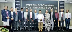  ??  ?? Representa­tives of partnering institutes and businesses with Power Minister Dullas Alahapperu­ma and ministry officials at project inaugurati­on ceremony
