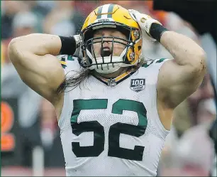  ?? AP ?? Green Bay Packers linebacker Clay Matthews reacts to getting flagged for a tackle on Washington quarterbac­k Alex Smith on Sunday.