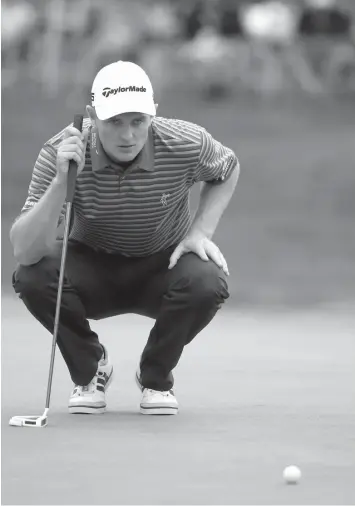  ?? AGENCE FRANCE PRESSE ?? Justin Rose of England lines up a putt on the 16th green during the third round of the World Golf Championsh­ips - Bridgeston­e Invitation­al at Firestone Country Club South Course in Akron, Ohio.