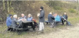  ??  ?? ●● The ramblers enjoy lunch at Sparklow