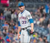  ?? KYUSUNG GONG/ AP PHOTO ?? New York Mets pitcher Matt Harvey of Mystic made an apperance in relief Friday against the San Diego Padres in San Diego.