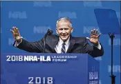  ?? DANIEL ACKER / BLOOMBERG ?? Retired Lt. Col. Oliver North, speaking Friday at the NRA convention in Dallas, is expected to assume the NRA presidency within the next several weeks.