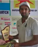  ??  ?? Yash Sehrawat receives his man of the match trophy.