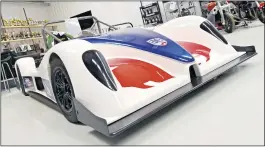  ??  ?? AB Performanc­e will run three Sabre Escala cars (above) in Bikesports