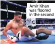  ??  ?? Amir Khan was floored in the second