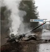  ?? ?? A Russian tank
destroyed by Ukrainian
forces