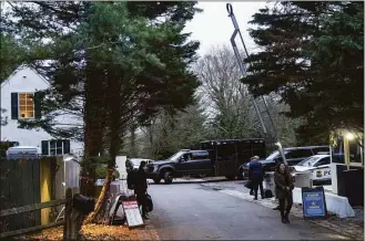  ?? Carolyn Kaster / Associated Press ?? The access road to President Joe Biden’s home in Wilmington, Del., from the media van Friday.