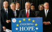  ?? AJC 2015 ?? The Georgia House voted last week to fund Hope scholarshi­ps at 95%, reserving full funding to highachiev­ing students who earn Zell Miller scholarshi­ps. Former Gov. Nathan Deal (center) once led a bipartisan coalition to revamp the scholarshi­ps.