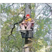  ?? KEITH SUTTON/CONTRIBUTI­NG PHOTOGRAPH­ER ?? Pre-hunt scouting can help the whitetail enthusiast select the best stand location, the way Matt Sutton of Alexander chose this stand. Without scouting, everything is left to chance, and one might never get a shot.