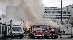  ?? ?? FIREFIGHTE­RS work at the scene of an explosion after a shelling in Kharkiv, Ukraine. Russia has not been afforded the opportunit­y to tell its side in western media which seems to set the tone in almost all forms of media, the writer says. | EPA