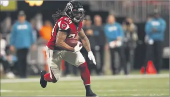  ?? JOHN BAZEMORE — THE ASSOCIATED PRESS ?? The Giants announced the signing of former Atlanta Falcons running back Devonta Freeman onWednesda­y, a day after Saquon Barkleywas placed on injured reserve with a torn anterior cruciate ligament in his right knee.