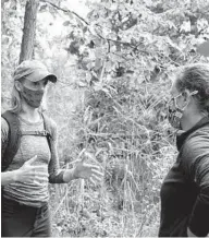  ?? UNIVERSITY OFMARYLAND
HANNAHFIEL­DS/ ?? University of Maryland Professor Kate Tully, left, talks with Professor Holly Michael of the University of Delaware about the potential to use the St. Jones Reserve south of Dover as a research site for a $4.3 million National Science Foundation grant to study the transformi­ng effects of invading saltwater on the already watery coastal lands of the Delmarva Peninsula.