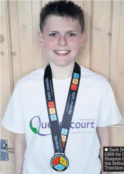  ??  ?? Zack Dowling raised £868 for Queenscour­t Hospice by completing the Sefton Community Triathlon