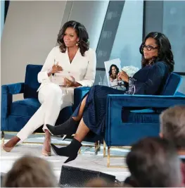  ??  ?? Michelle Obama in conversati­on with Oprah Winfrey. OPPOSITE: Tunic, Proenza Schouler. Earrings, Jennifer Fisher. Necklace, Sophie Buhai