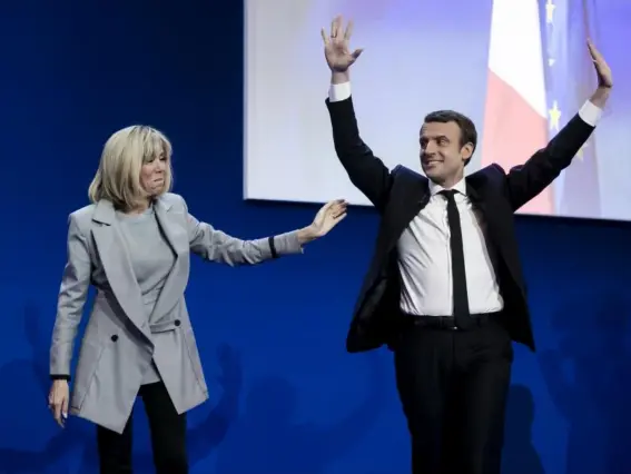  ??  ?? Emmanuel Macron with his wife Brigitte Trogneux after winning the first round of voting (Getty)