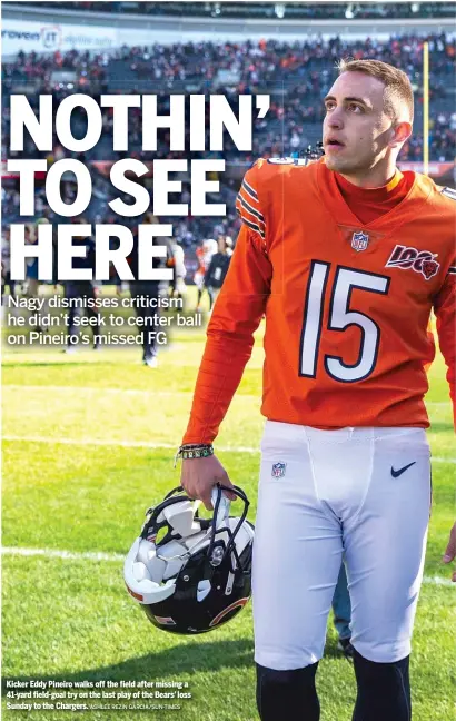  ?? ASHLEE REZIN GARCIA/SUN-TIMES ?? Kicker Eddy Pineiro walks off the field after missing a 41-yard field-goal try on the last play of the Bears’ loss Sunday to the Chargers.