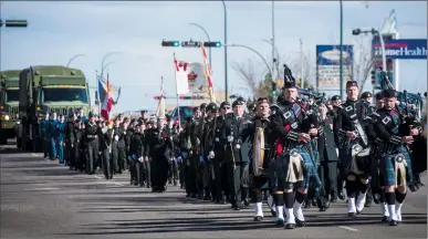  ?? Herald photos by Tijana Martin ?? Members of the 20th Independen­t Field Battery, Royal Canadian Artillery and Cadets make their way down Stafford Drive South toward city hall on Saturday during a parade to commemorat­e the 100th anniversar­y of the Battle of Vimy Ridge. @TMartinHer­ald