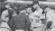  ?? HARRY HOW / GETTY IMAGES ?? Steven Matz of the New York Mets listens to manager Terry Collins as he gives instructio­ns. Analytics show the onus is on the players to pick up the pace of play, which has been an impediment in recent years.